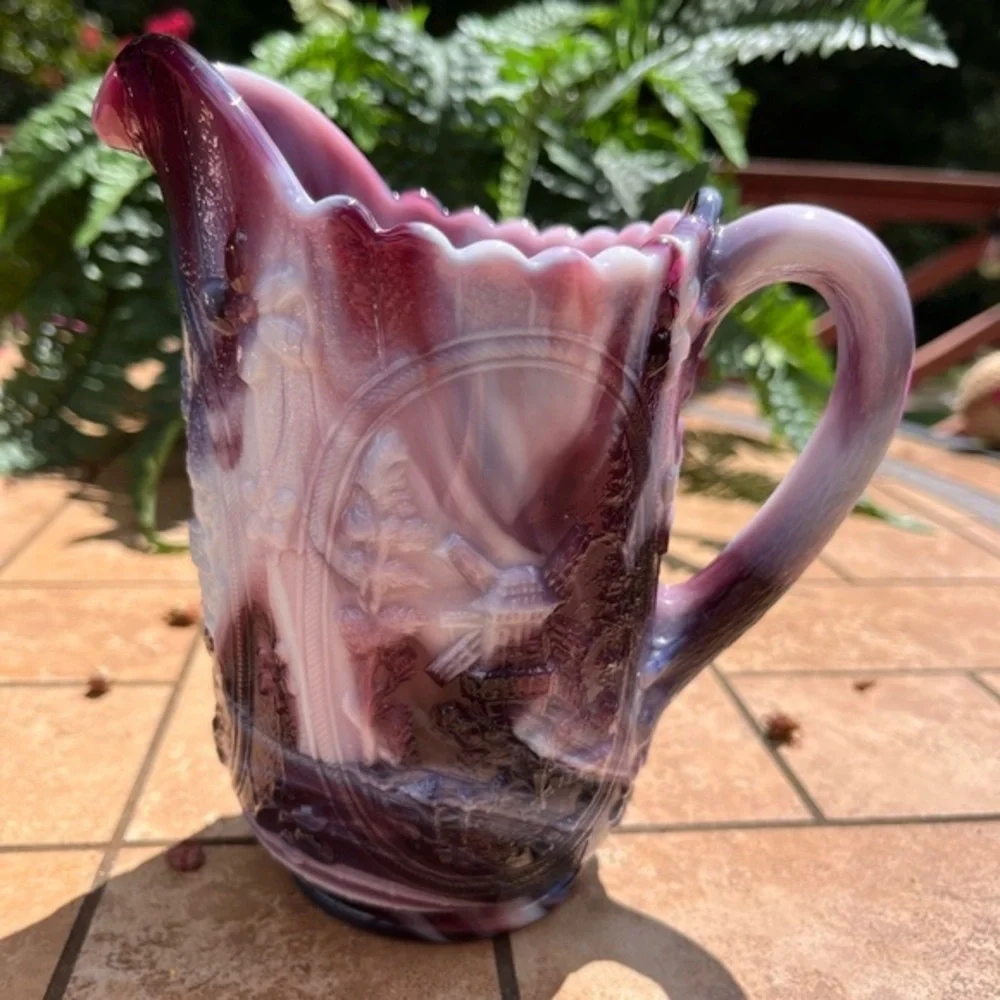 Vintage embossing windmill design glass pitcher